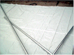 Lay out the tarp and spars