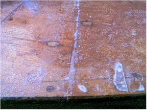 A seam and bubble are shown here.  The will need to be ground flat and/or filled.  There are a number of seams on the deck, but fortunately, few bubbles.