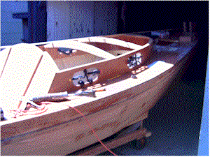 Outer hatch stops installed and portlights cut out